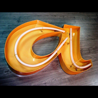 Reclame luminoase cu litere channel www.indigoneon.ro